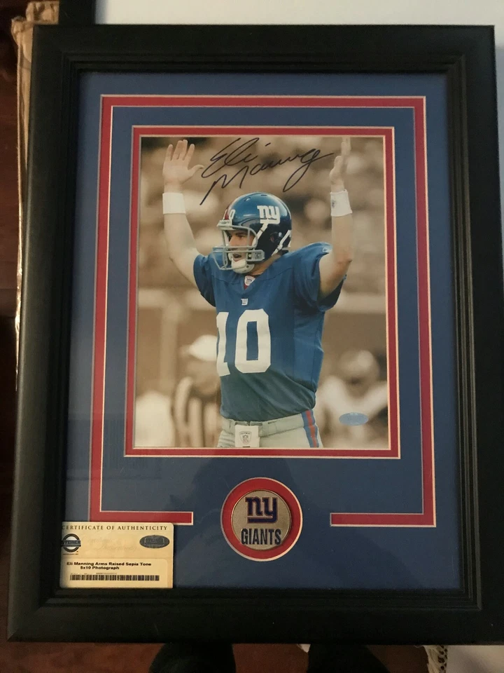 Eli Manning arms Raised signed auto 8x10 photograph NY Giants NFL Football sport - Image 1 of 1