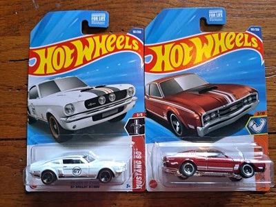 Hot Wheels 1:64 Muscle Mania '69 Mercury Cyclone & '67 White Shelby GT500 - Image 1 of 3