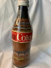Sand Art Created inside a Coca Cola Bottle