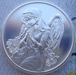 1 oz. UN ÁNGEL EN TU BOLSILLO rondas BU .999 plata fina - Imagen 1 de 4