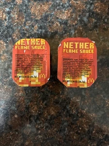 NUEVO McDonald's EDICIÓN LIMITADA Minecraft Película Nether Flame Sauce 2025 Juego de 2 - Imagen 1 de 3