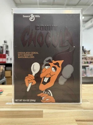 KAWS Monsters Count Chocula Cereal Edición Limitada en Estuche Acrílico Foto 1 de 2