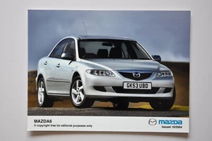 Foto de prensa de coche - Mazda 6 2004 - metálico - vista frontal/lateral - Imagen 1 de 1