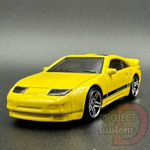 Hot Wheels Nissan 300ZX Twin Turbo Yellow 1:64 Diecast 2023 New - Picture 1 of 3