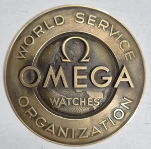 ANTIQUE & RARE OMEGA WATCH CIRCULAR BRONZE PLAQUE IN RELIEF SIGN WORLD SERVICE + - Picture 1 of 8