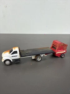 ERTL AGCO White 4-210 toy truck with a baler, 1:32 scale die-cast replica. - Picture 1 of 11