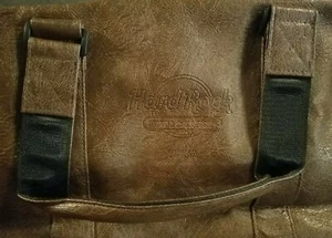 Bolso de Lona Hard Rock Hotel Casino Tulsa Logo Marrón Cuero Vegano 20" Nuevo con Etiquetas Nuevo - Imagen 1 de 8
