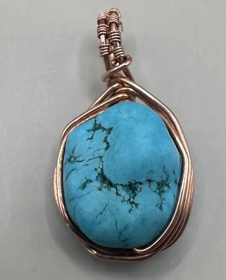 Hand Crafted Turquoise pendant With Herring Bone Copper Wire Wrap - Image 1 of 3