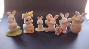 Sieben Keramik Hasen Figuren - Bild 1 von 12