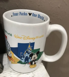 WALT DISNEY WORLD FOUR PARKS ONE WORLD MOM WHITE COFFEE MUG MICKEY MOUSE EPCOT - Picture 1 of 6