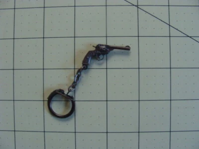 KEY CHAIN SIX SHOOTER GUN - Image 1 of 2