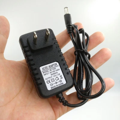 Power Supply Adapter 12V/2A AC To DC US Plugs Converter For CCTV Safety Camera - Image 1 of 4