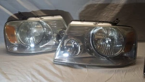 Two (2) 2005 Ford F150 Headlights - Picture 1 of 10