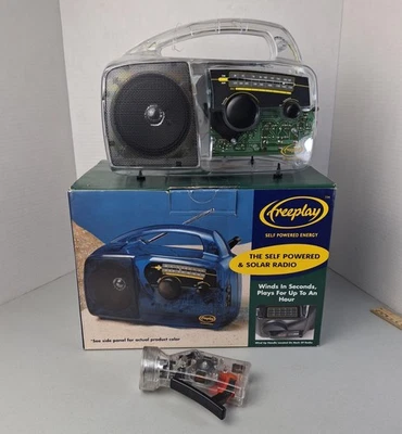 Freeplay Self Powered & Solar AM/FM Radio Wind Crank Up Transparent Blue - Image 1 of 4