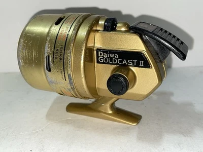Carrete Spincast de rodamiento de bolas de alta velocidad Daiwa Goldcast II 512RL hecho en Japón Foto 1 de 4