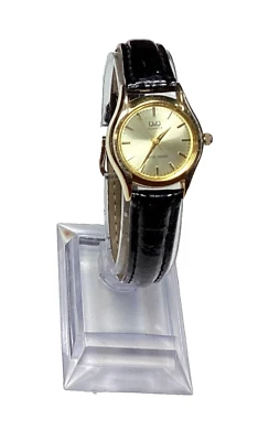 Q&Q Reloj Mujer Tono Dorado Dial Negro Batería Nueva Foto 1 de 4