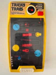 TRICKY TRAPS - TOMY - MADE IN SINGAPORE - Foto 1 di 14