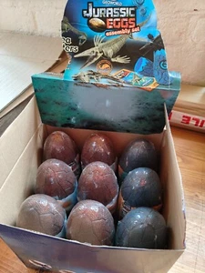 9 x Großhandel Jurassic Ei Dinosaurier Ei Spielzeug Spiele Ausgrabungsset Dino Tasche Füller AA - Bild 1 von 17