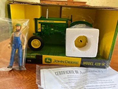 JD model 420-W die-cast 1/16 collectible tractor w/jointed farmer John figure - Image 1 of 4