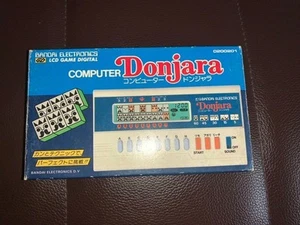 Items From The Time Bandai Lcd Computer Donjara Ken Game Watch Retro Lsi 80S Sho - Afbeelding 1 van 7