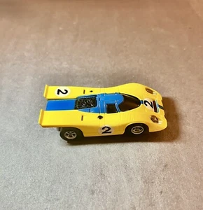 AFX Porsche 917 HO Slot Car Yellow/Blue #2 With Lighted Magnatraction Chassis - Picture 1 of 6