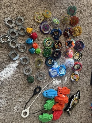 Beyblade lot set with launchers - image 1 of 4