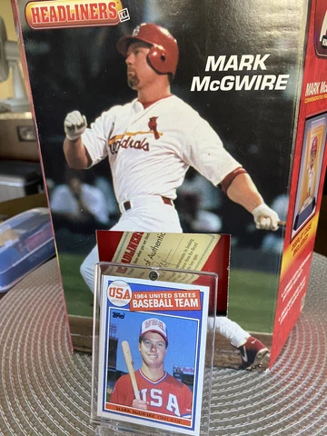 mark mcgwire rookie card (raw)and rare action figure Cover