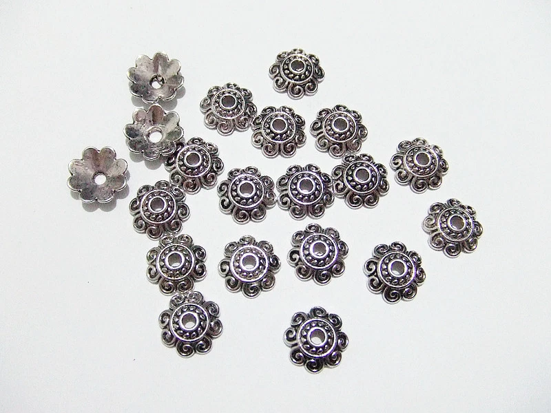 30pz coppette fiore 10x3mm  colore argento tibet - Immagine 1 di 1