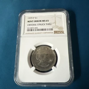 1979-P SBA $1 Susan B Anthony Dollar ERROR Obverse Struck Thru NGC MS 65 - Picture 1 of 5