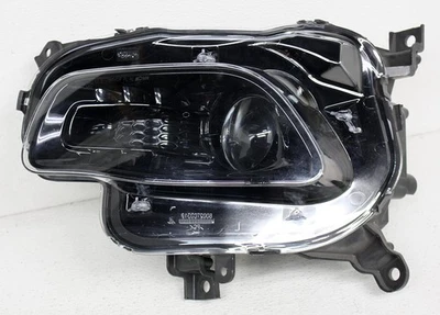 Faro halógeno del lado izquierdo del conductor OEM para Jeep Cherokee negro bisel lengüeta falta Foto 1 de 4