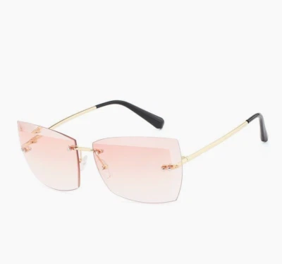 Gafas de sol de gran tamaño para mujer cuadradas sin montura moda lente de corte de diamante rosa UV400 Foto 1 de 4