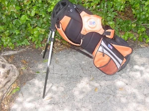 USKG ORANGE SCHWARZ DUAL STRAP GOLF JUNIOR KINDER TRAGESCHLÄGER STÄNDER 1 TASCHE 4 WEGE 28" - Bild 1 von 4