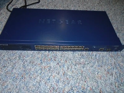 NETGEAR ProSafe 24 Smart Switch 24 Ports 10/100 with 2 Gigabit ports FS726T - Image 1 of 4