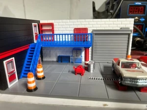 Spur Ho Slotcar/Druckguss Garage Diorama - Bild 1 von 4