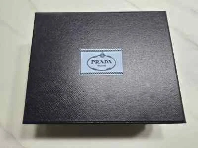 Prada sells unused nylon crossbody bags. - Image 1 of 4