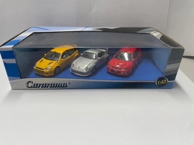 Juego de 3 Porsche, Ford, etc. Modelos diecast Cararama escala 1:43. Como nuevo y estuche Foto 1 de 4