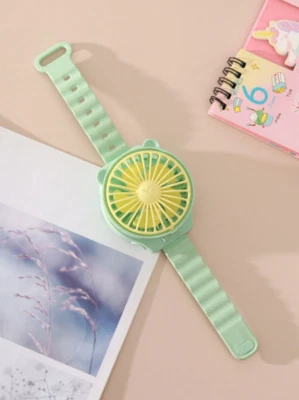 Mini ventilador para reloj de dibujos animados de 1 pieza - portátil AAA a batería refrigeración exterior - NUEVO Foto 1 de 4