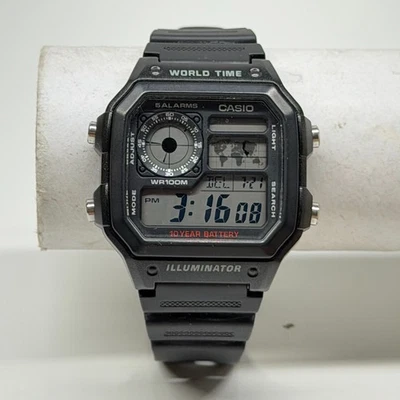 Casio AE-1200WH Reloj Digital Hora Mundial Hombre 3299 Iluminador WR100M Funciona Foto 1 de 4