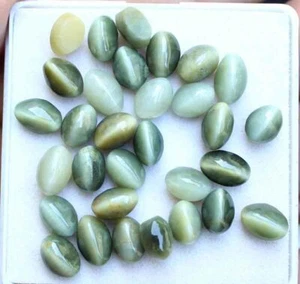 39,8 ct 6*9 mm natürlicher Katzenauge Quarz oval Cabochonschliff lose Edelsteine 31 Stck. - Bild 1 von 3