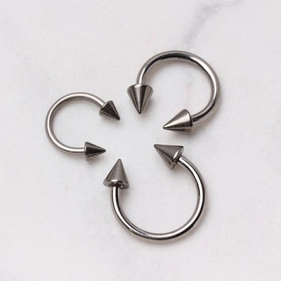 Grade 23 Titanium Horseshoe with Spikes - Image 1 of 3