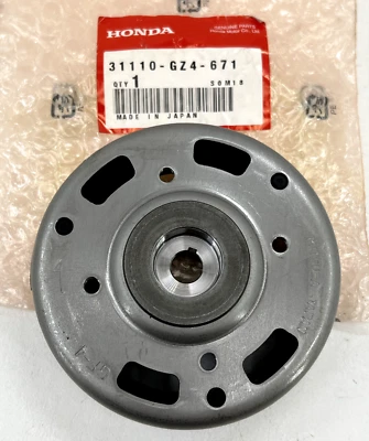 GENUINE HONDA 31110-GZ4-671 MOTORCYCLE 1991-96 EZ90 FLYWHEEL (MITSUBA) NOS OEM - Image 1 of 4