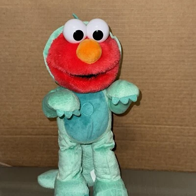 Peluche de 13 pulgadas Sesame Street Dino Stomp Elmo canta y baila. Foto 1 de 4