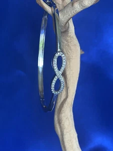 Sterling and Diamond infinity hinged bangle bracelet - Picture 1 of 5