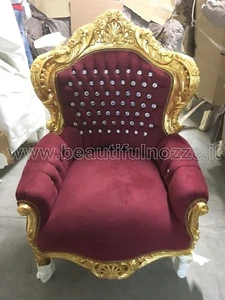 POLTRONA IN LEGNO FOGLIA ARGENTO E TESSUTO ROSSO CON CRISTALLI - Foto 1 di 1