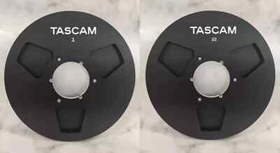 Un par de carretes de cinta de carrete a carrete de aluminio negro TASCAM 10,5"" 1/4 X-2000R Foto 1 de 2