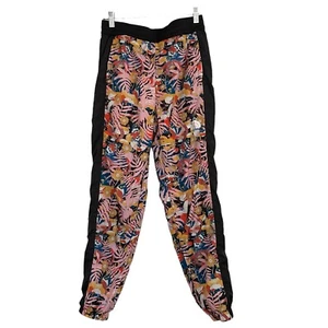 Pantalones cortavientos The North Face para mujer pequeños estampados Hydrenaline coloridos brillantes - Imagen 1 de 15