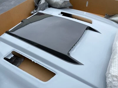 Ford Mustang GT500 2010-2014 capó de mangosta con ampolla central de fibra de carbono Foto 1 de 4