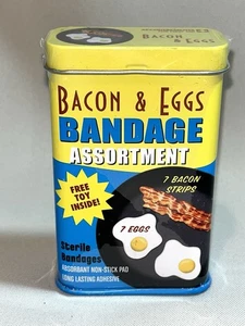 Assortimento bende pancetta e uova NUOVE in scatola di metallo divertente bavaglio regalo - Foto 1 di 4
