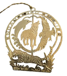 Gefährdete Arten Ornament goldgetöntes Metall Adler Wolf Delfin Tiger - Bild 1 von 4