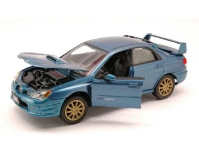 MODELLINO AUTO STATICO MOTORMAX IMPREZA WRX STI 2003 BLU MODELLISMO SCALA 1:24 - Immagine 1 di 2